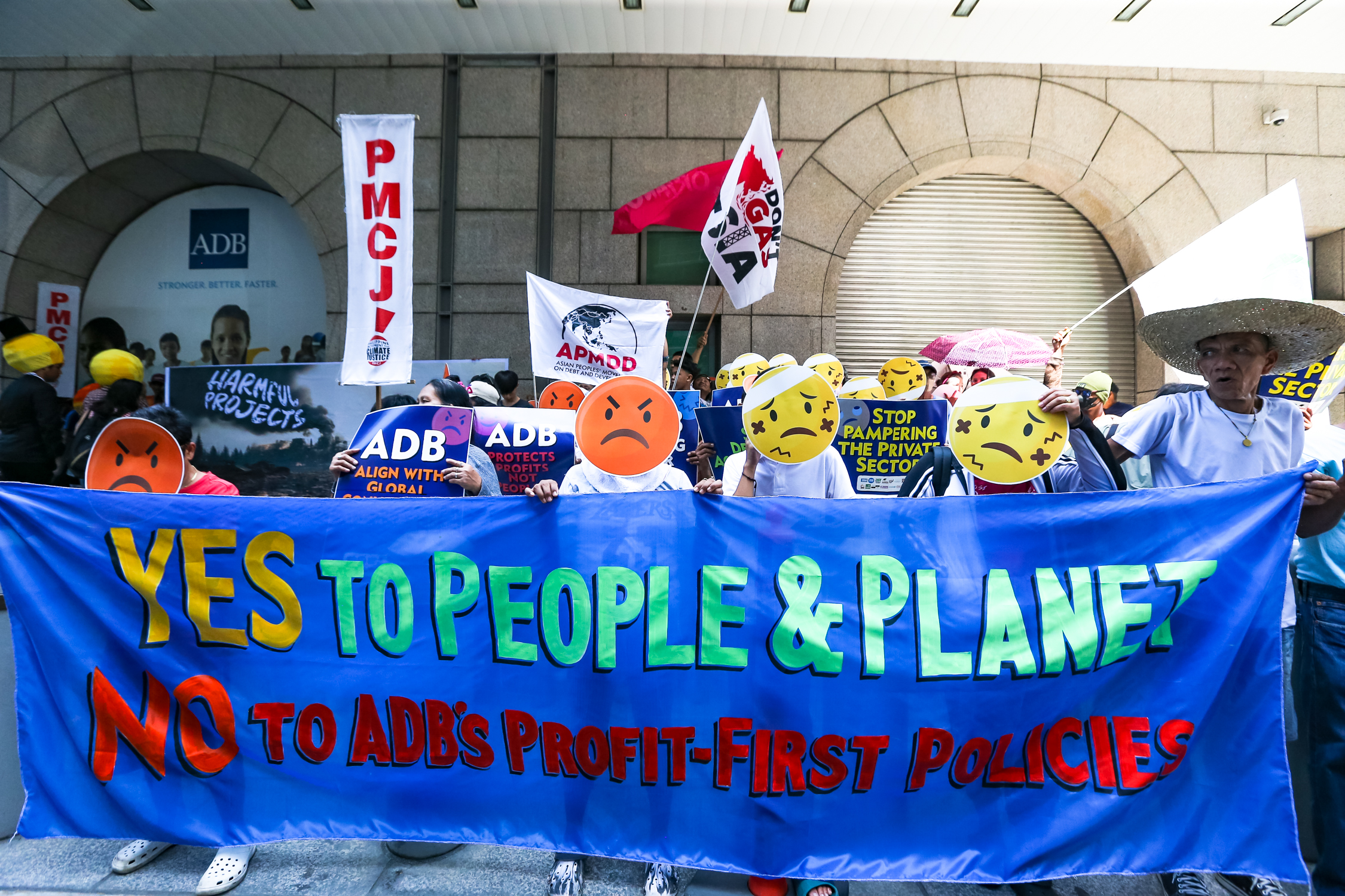 people protest outside Asian Development Bank headquarters in Manila_April 2024